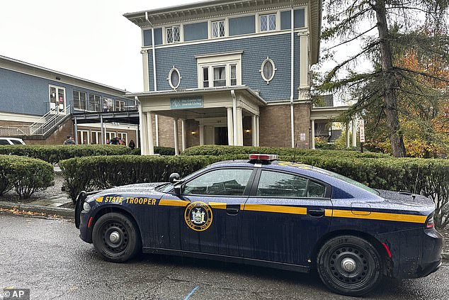 A New York State Police Department cruiser is parked Monday in front of Cornell University's Center for Jewish Living in Ithaca, NY.