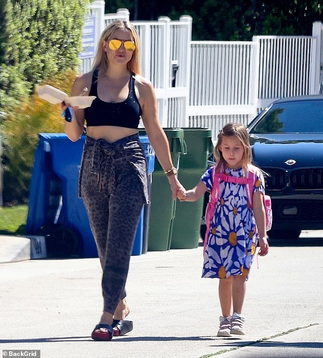 Mother and daughter outing: Kate Hudson opted for a sporty look as she enjoyed a walk with her five-year-old daughter Rani in Los Angeles on Wednesday