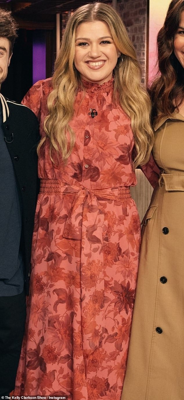 Slim is in: On Monday, the songbird looked slim in a long coral pink dress with floral print and a belt to accentuate her tiny waist during her talk show