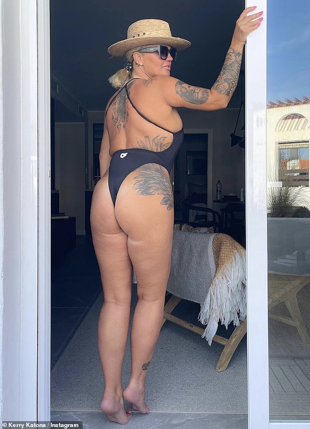 Wow!  Kerry Katona, 43, is being praised for 'empowering women' after taking to Instagram on Thursday, where she exposed her 'raw, unfiltered' curves in a thong swimsuit