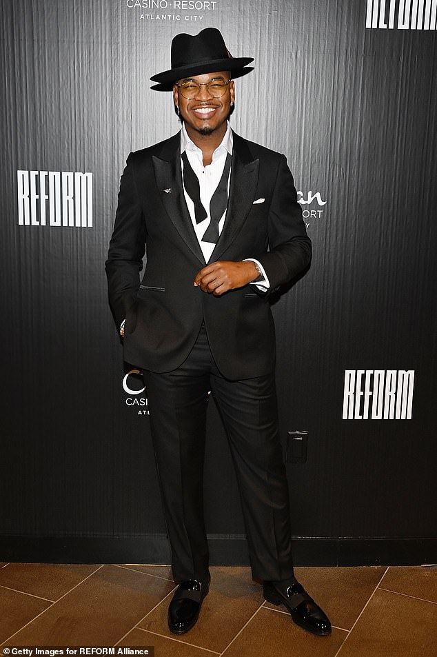 Suitable: Ne-yo looked dapper in a black tuxedo with a loose Sinatra-style bow tie