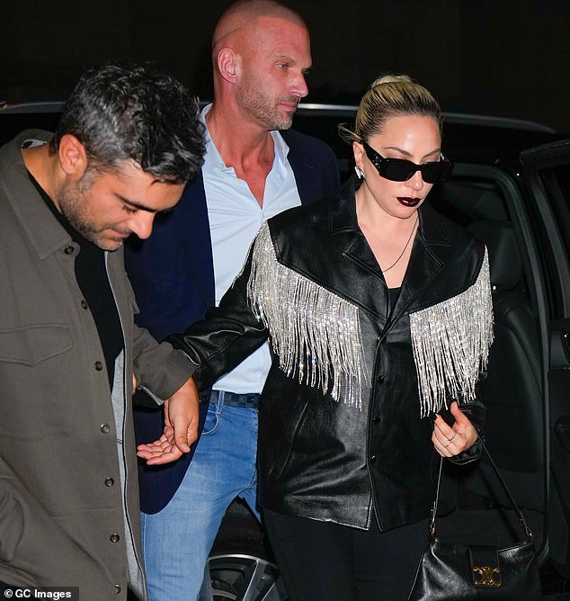 Back on?  Lady Gaga, 37, was spotted again with her on-off boyfriend Michael Polansky, 45, on Saturday as they headed out in Midtown, New York City