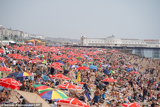 Last month was the warmest September on record, data shows.  Pictured: Brighton Beach on September 10, when temperatures reach 30 degrees Celsius