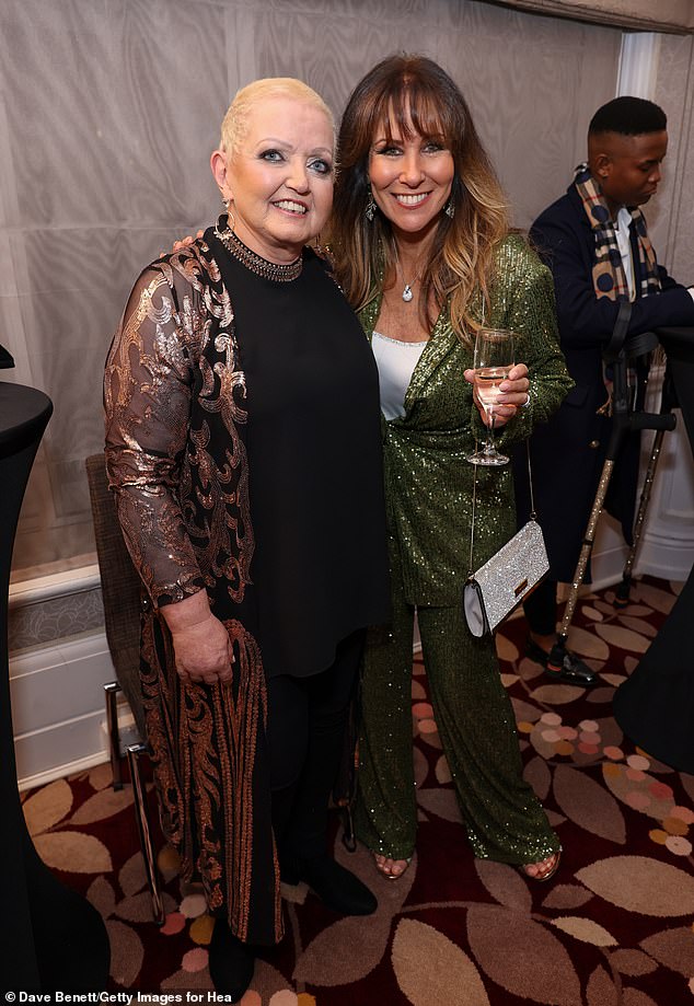 Special night: Linda Lusardi also snapped with singer Nolan, also known as Linda, who was one of the honorees at the awards ceremony where she was recognized for living with secondary cancer so openly and honestly