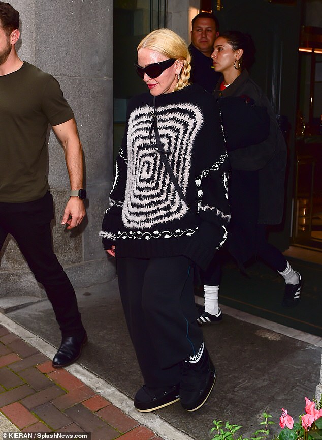 To feel good!  Madonna looked in good spirits as she headed out for another day of rehearsals in Manchester on Tuesday, ahead of her first concert at London's O2 Arena on Saturday