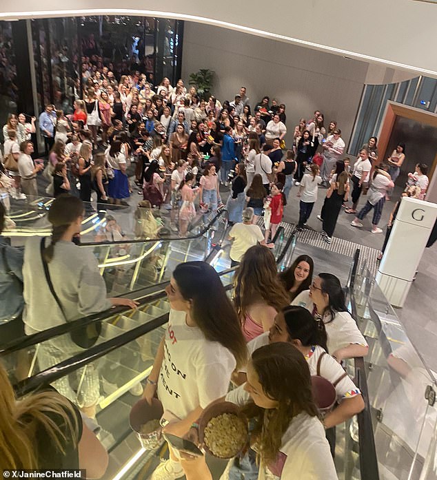 Westfield Karrinyup in Perth was evacuated late on Friday night (pictured, moviegoers in lobby)