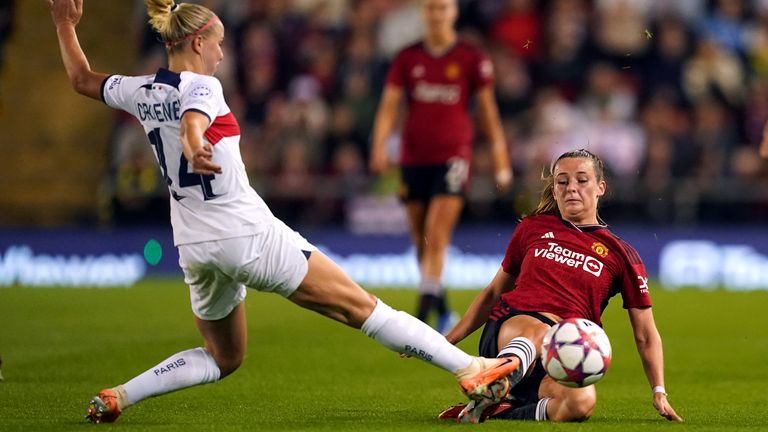 Manchester United's Ella Toone and Paris Saint-Germain's Jackie Groenen battle for the ball during the UEFA Women's Champions League second qualifying round, first leg match at Leigh Sports Village