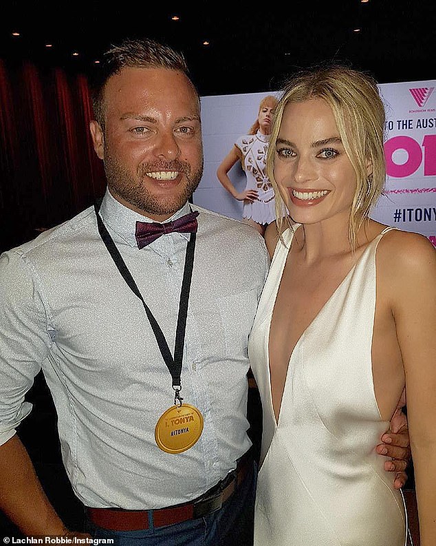 Margot Robbie's eldest brother has raised eyebrows after he posted a nasty remark about his famous sister Barbie's hit.  (Pictured: Lachlan and Margot Robbie)