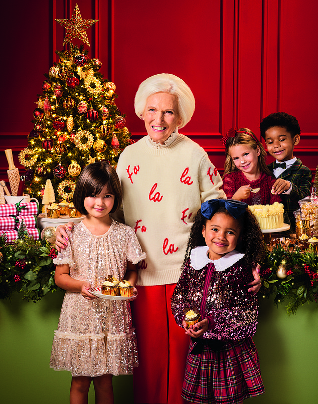 Dame Mary posed in a £275 cream wool-cashmere 'fa la la' Chinti & Parker Christmas jumper for the cover shoot featuring her alongside smiling children