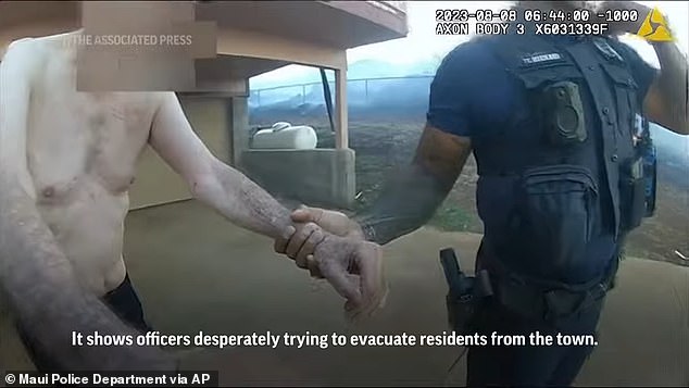 In part of the video, officers can be seen banging on the doors of a building before entering