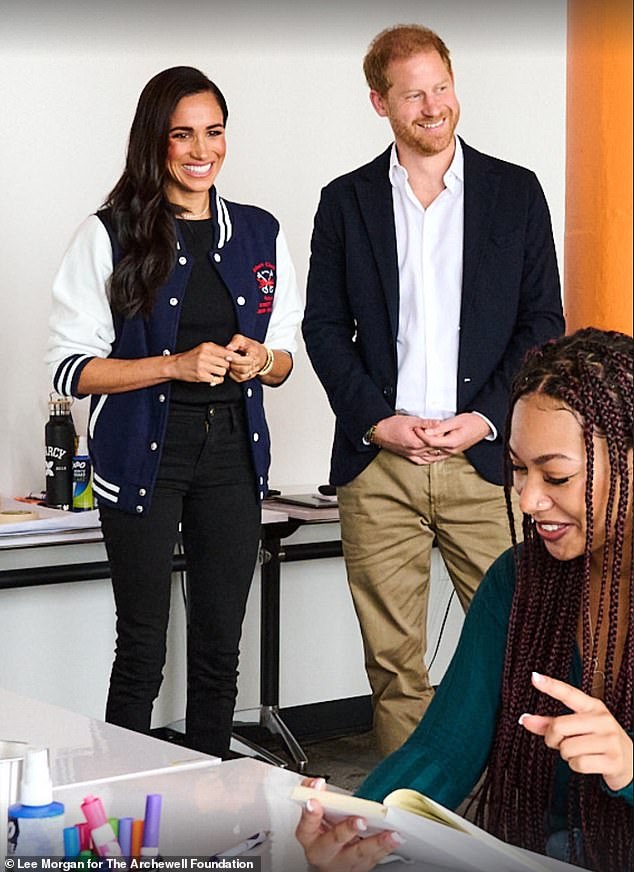 Prince Harry and Meghan Markle paid a visit to a Brooklyn school, with the Duchess wearing a letterman jacket she was gifted during her last solo engagement as a working royal