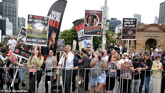 Protesters gathered en masse at the parade to shout against the procession and hold up graphic signs in 2022