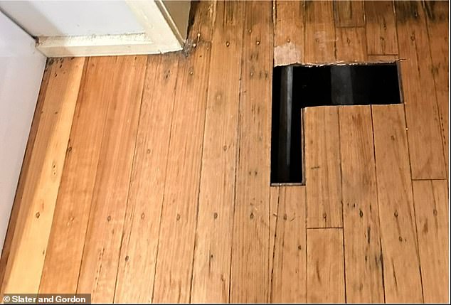 The hole in the wooden floor of the Melbourne rental property after woman claims she fell through it.  She said she and her partner asked the broker to resolve the issue