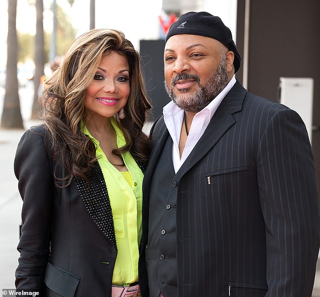 Theft: Film producer Jeffre Phillips, right, the former fiancée of La Toya Jackson, left, was accused of stealing personal items for nine days at his Carolwood mansion after his death;  seen in 2014