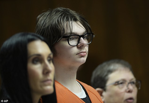 Ethan Crumbley stands with his attorneys, Paulette Loftin and Amy Hopp during his hearing in Oakland County Circuit Court, August 1, 2023 in Pontiac, Michigan