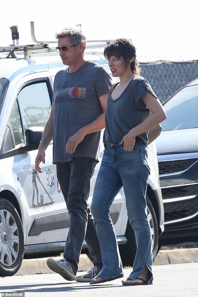 Busy day: Milla Jovovich (47) and her husband Paul VS Anderson (58) were spotted house hunting in Los Angeles on Tuesday