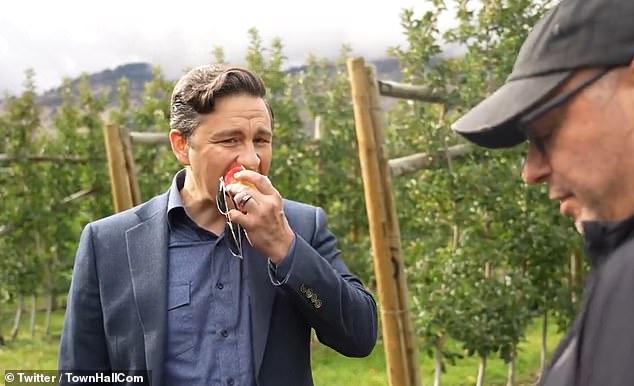 Canada's Conservative party leader Pierre Poilievre was filmed calmly ripping apart a reporter who compared him to Donald Trump while casually munching on an apple.