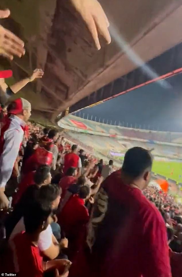 Footage shows dozens of Persepolis FC fans (pictured) chanting defiantly at Tehran's Azadi Stadium - after Islamic Republic of Palestine officials and supporters installed and waved Palestinian flags during Iran's Super Cup final