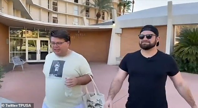 Two members of Turning Point USA, one seen on the right, were captured on camera confronting an LGBTQ+ Arizona State University professor, David Boyes, left, on campus