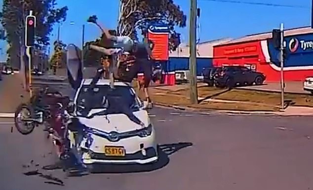 Three teenagers were thrown from their electric scooter after crashing into a Toyota Corolla (above) in Sydney's west