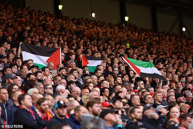 Several Palestinian flags were held aloft by supporters at Anfield during the Merseyside derby