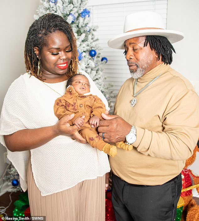 Phillip Smith has no regrets about becoming a father at 62 (pictured with wife Hasina, 42, and their newborn son in 2022)