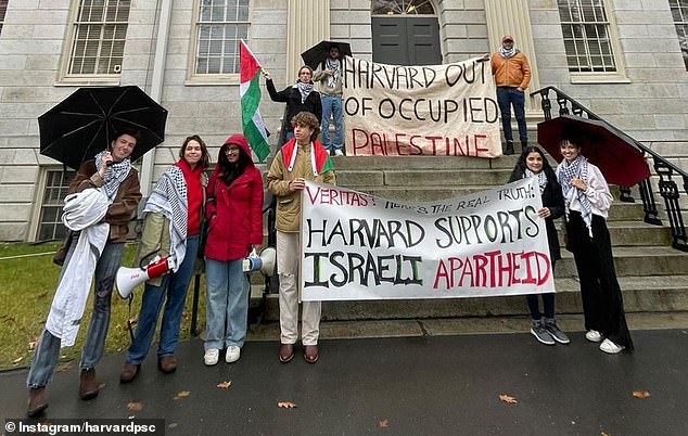 The Palestinian Solidarity Committee holds banners outside Harvard University