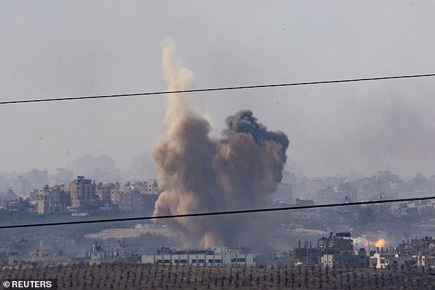 Smoke rises after an Israeli attack in the Gaza Strip, seen from Israel, October 31, 2023