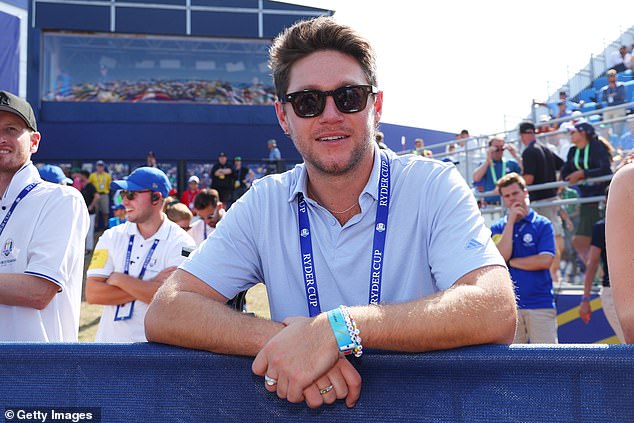 Relaxed: Niall Horan cut a nonchalant figure on Saturday as he enjoyed a day out at the Ryder Cup competition in Rome, Italy