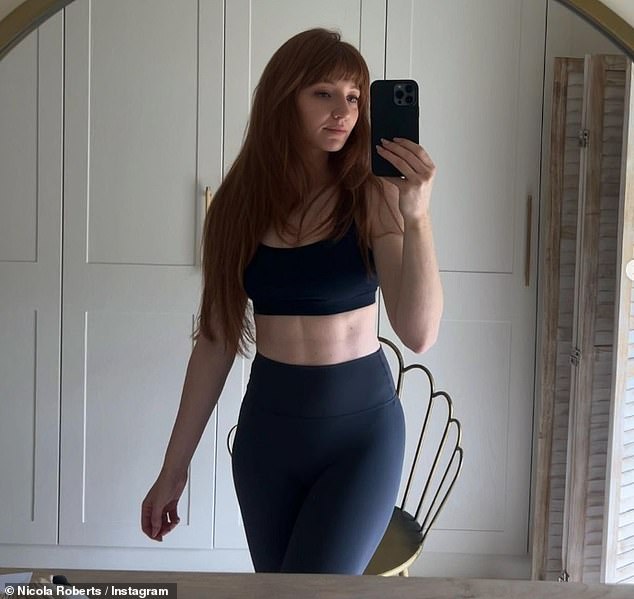 Incredible: Nicola Roberts, 38, showed off her toned abs in a sports bra as she updated fans on her fitness journey in an Instagram snap on Thursday