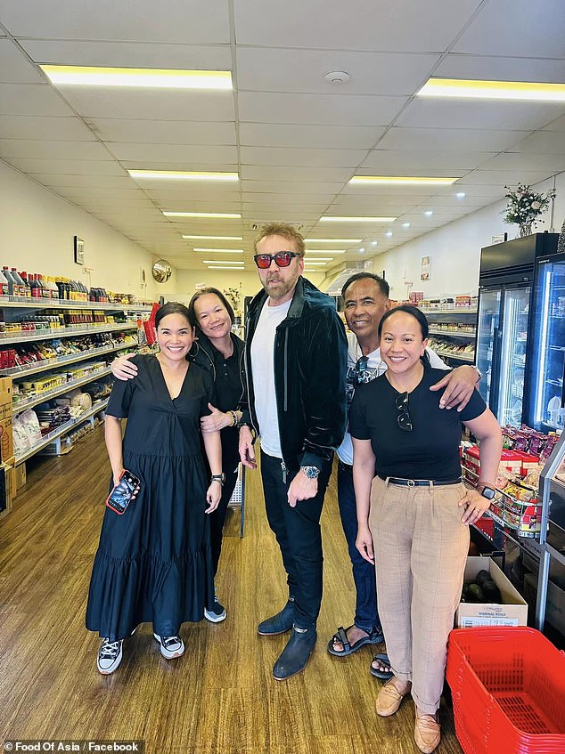 Nicolas Cage arrived in Western Australia on Monday to film his new film.  The first thing the Hollywood star did after landing was get some food for himself and his family.  The 59-year-old went to the small town of Busselton, near Margaret River.  Pictured with staff from Busselton Food of Asia