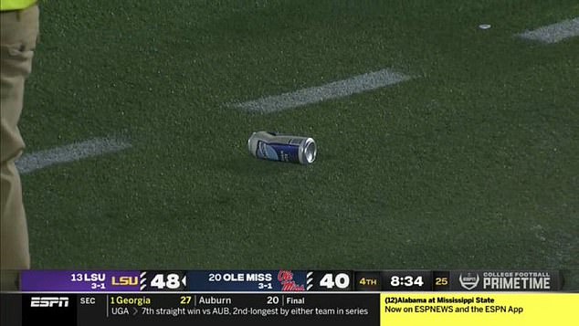 The game was halted in the fourth quarter when Ole Miss fans began throwing debris