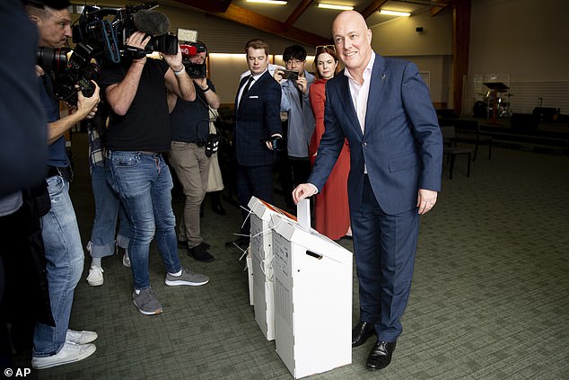 After two terms in office, the National party is well ahead in the polls compared to Labor (photo: Mr Luxon casting his vote in Auckland)