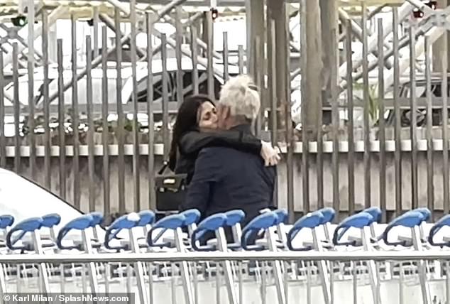 Hot: Sean Penn and his girlfriend Olga Korotyaeva looked completely stunned as they enjoyed a loved-up reunion at Nice Airport in the south of France on Monday