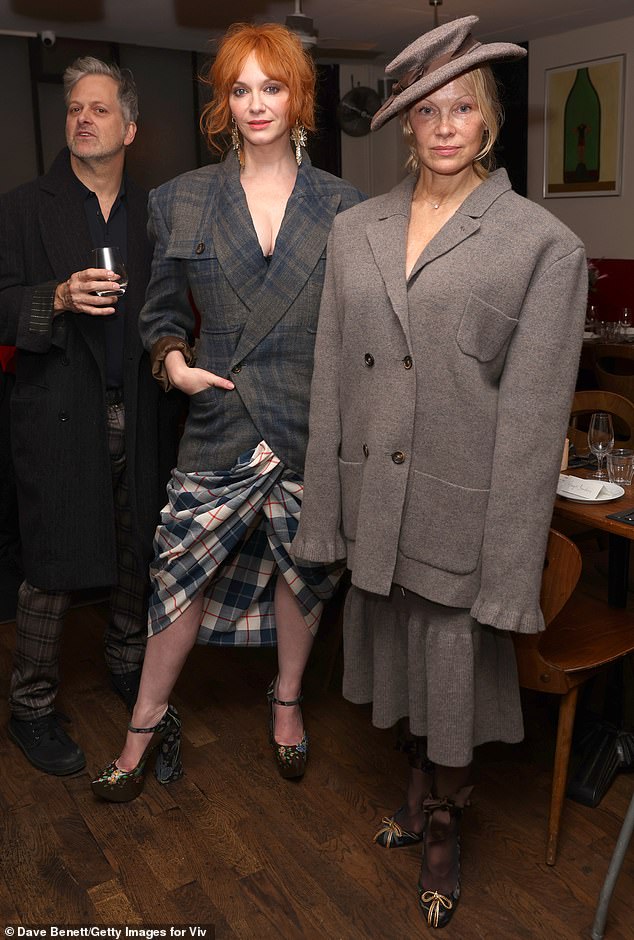 Glamorous evening: the star was seen wearing an oversized, gray double-breasted jacket made from felted cashmere material and with a matching skirt