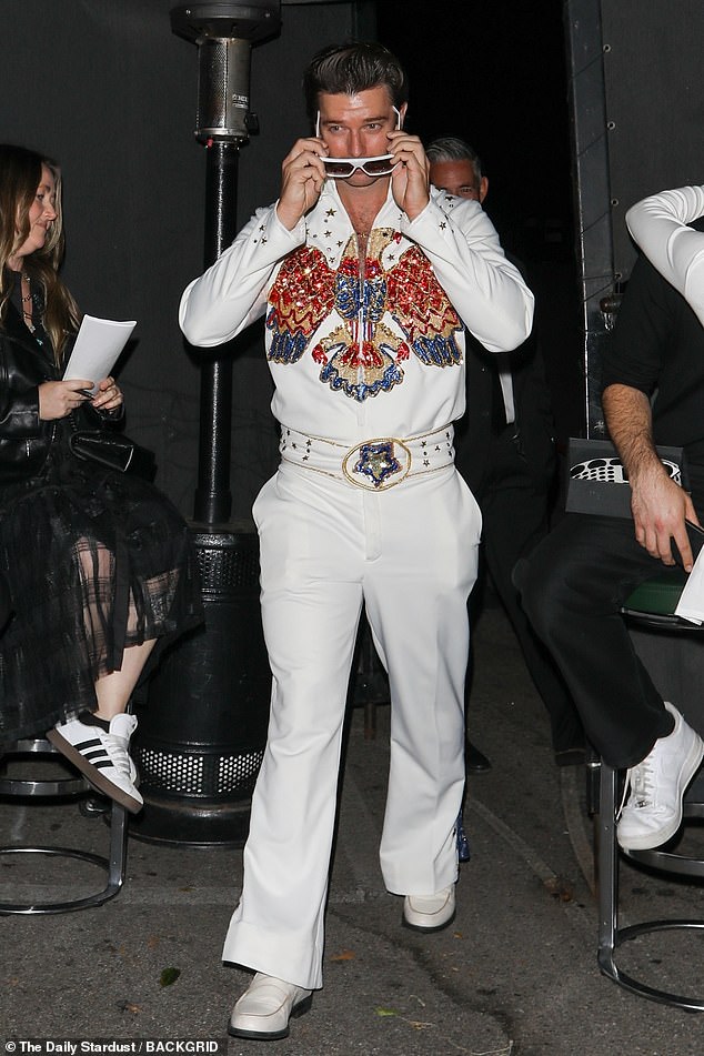 It's the king!  Patrick Schwarzenegger dressed as Elvis as he attended Kendall Jenner's Halloween bash at Chateau Marmont in Los Angeles on Saturday