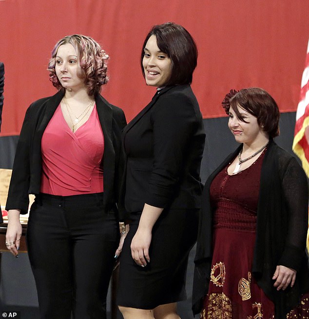 Kidnapping of survivors, Amanda Berry, Gina Dejesus and Michelle Knight, depicted on this photo from February 2014, after their escape in 2013