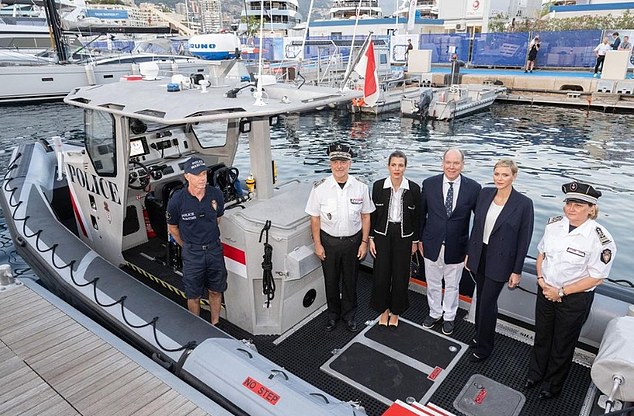Princess Charlene and Prince Albert of Monaco were spotted christening the 'Saint Georges' shuttle with Charlotte Casiraghi