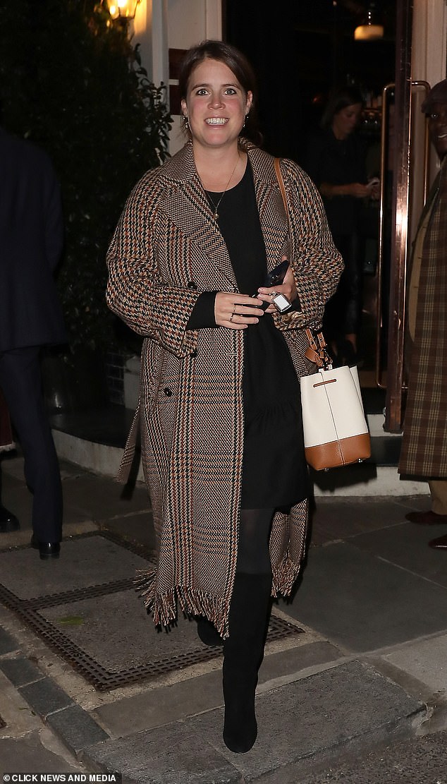 Princess Eugenie bundled up against the cold and appeared in good spirits as she left Casa Cruz in Notting Hill