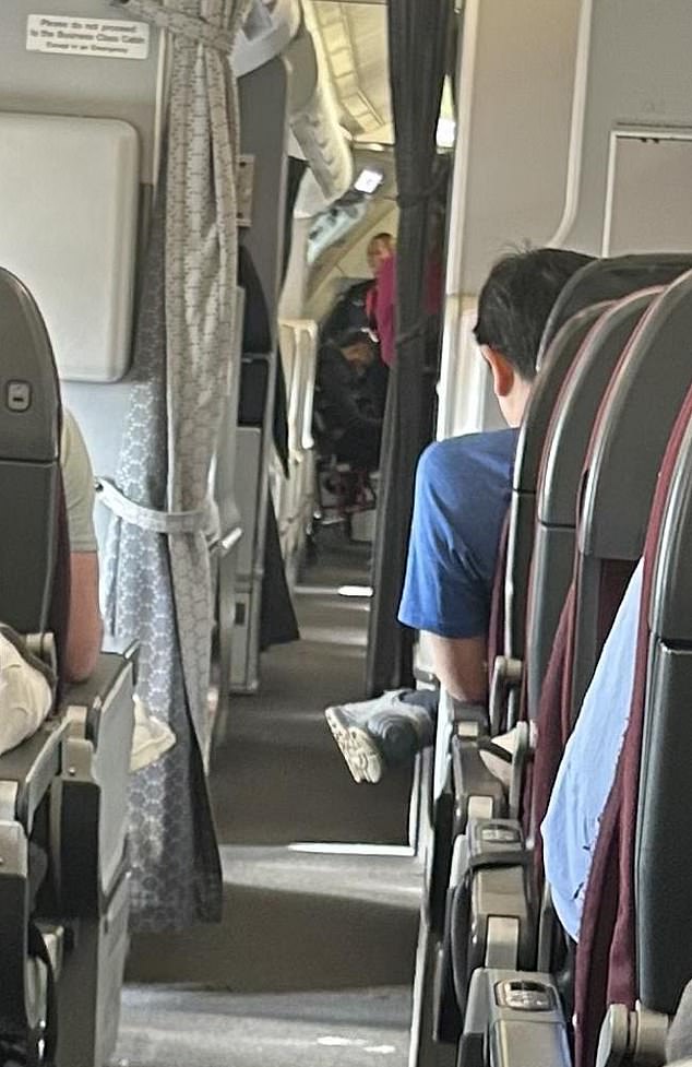 The Qantas plane departed for Darwin around 4pm on Sunday, where the male passenger was escorted from the plane by four cabin crew.