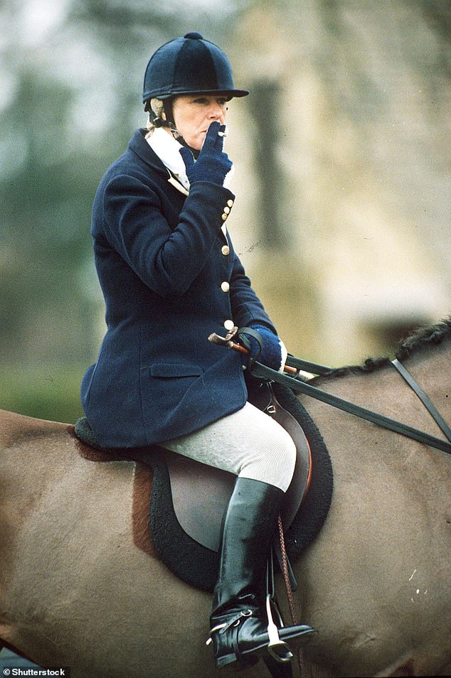 Looking immaculate in her riding gear, Camilla takes a break while riding with the Beautfort Hunt in 1996