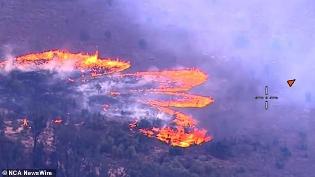 Residents have been ordered to evacuate Queensland's Western Downs as fast-moving fires burning in the state's south-west have been raised to emergency alert levels