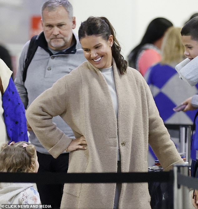 Fleeing the country: Rebecca Vardy was pictured leaving the country on Tuesday, just hours ahead of arch rival Coleen Rooney in the Wagatha Christie documentary