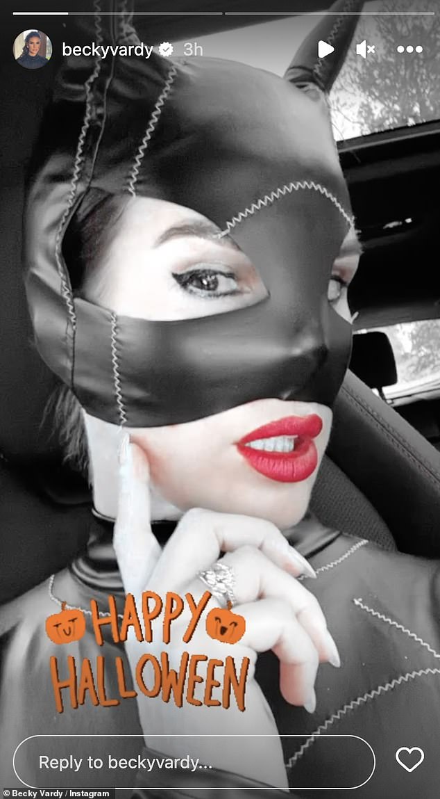 Scary: Rebekah Vardy, 41, shared a racy Halloween snap on Instagram on Tuesday, dressed as Catwoman in a latex jumpsuit