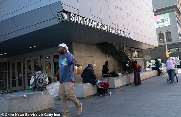 People gather outside the Federal Building in San Francisco