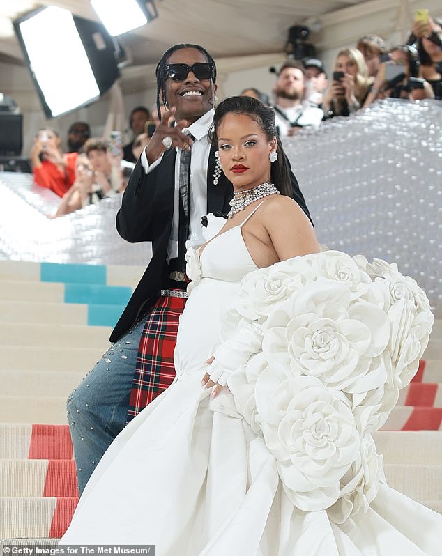 Happy couple: Rihanna announced her second pregnancy when she showed up to the Super Bowl halftime show with a baby bump in February;  couple seen in NYC in May