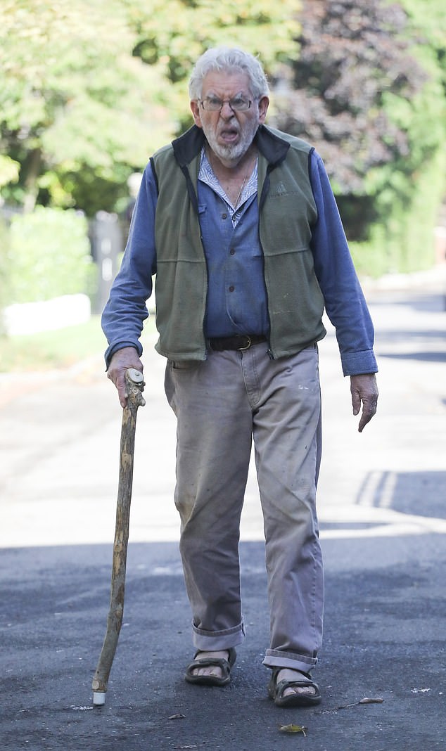 After being diagnosed with neck cancer, Rolf Harris (pictured during the pandemic) could no longer talk or eat and required 24-hour care