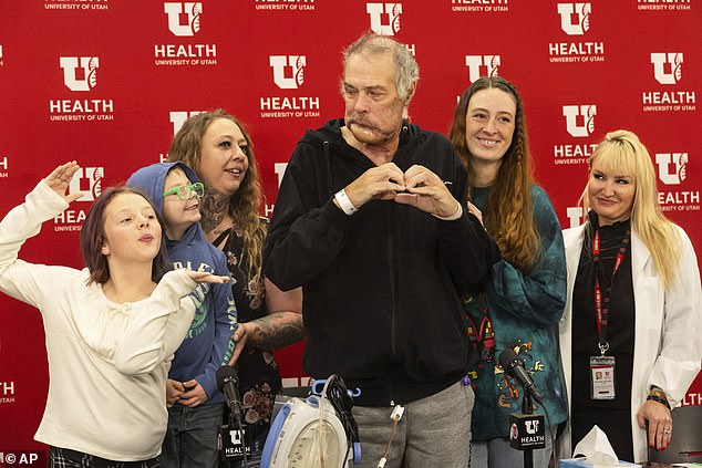 Noorlander happily walked out of the University of Utah Hospital on Monday with his daughter and two grandchildren by his side.  His grandson, who is looking up at him in the photo, now considers his grandfather a superhero