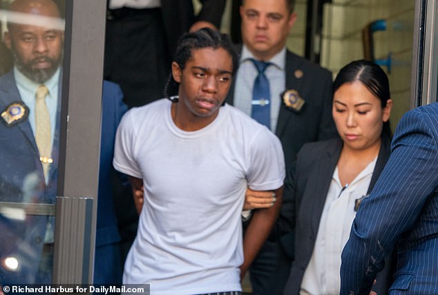 Brian Dowling, 18, walked out of the 81st precinct Thursday afternoon looking tearful