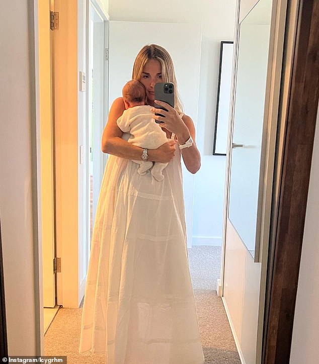 Other images showed Lucy (pictured) taking a mirror selfie holding the baby girl